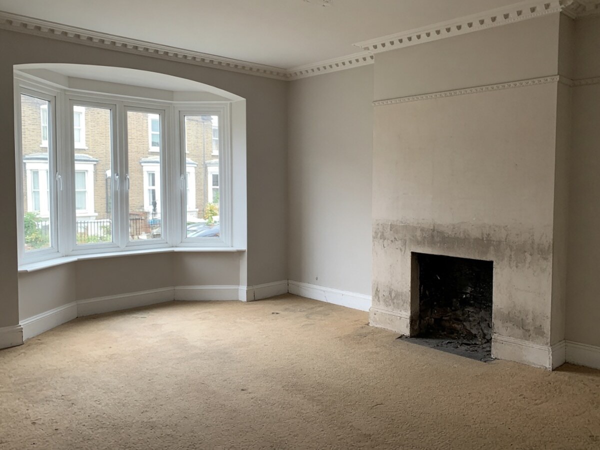 AI-generated illustration - Before: damp flagged on a buyer’s survey, not a photo of an EYR job