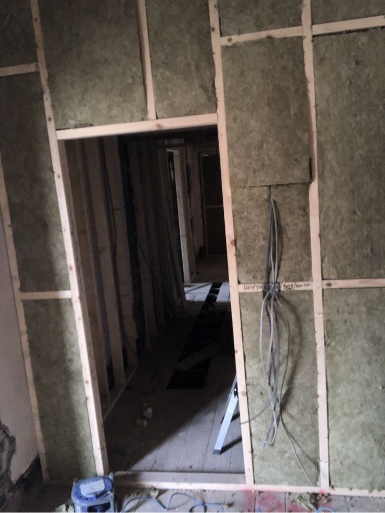 Stud wall framing and first-fix joinery on a renovation project